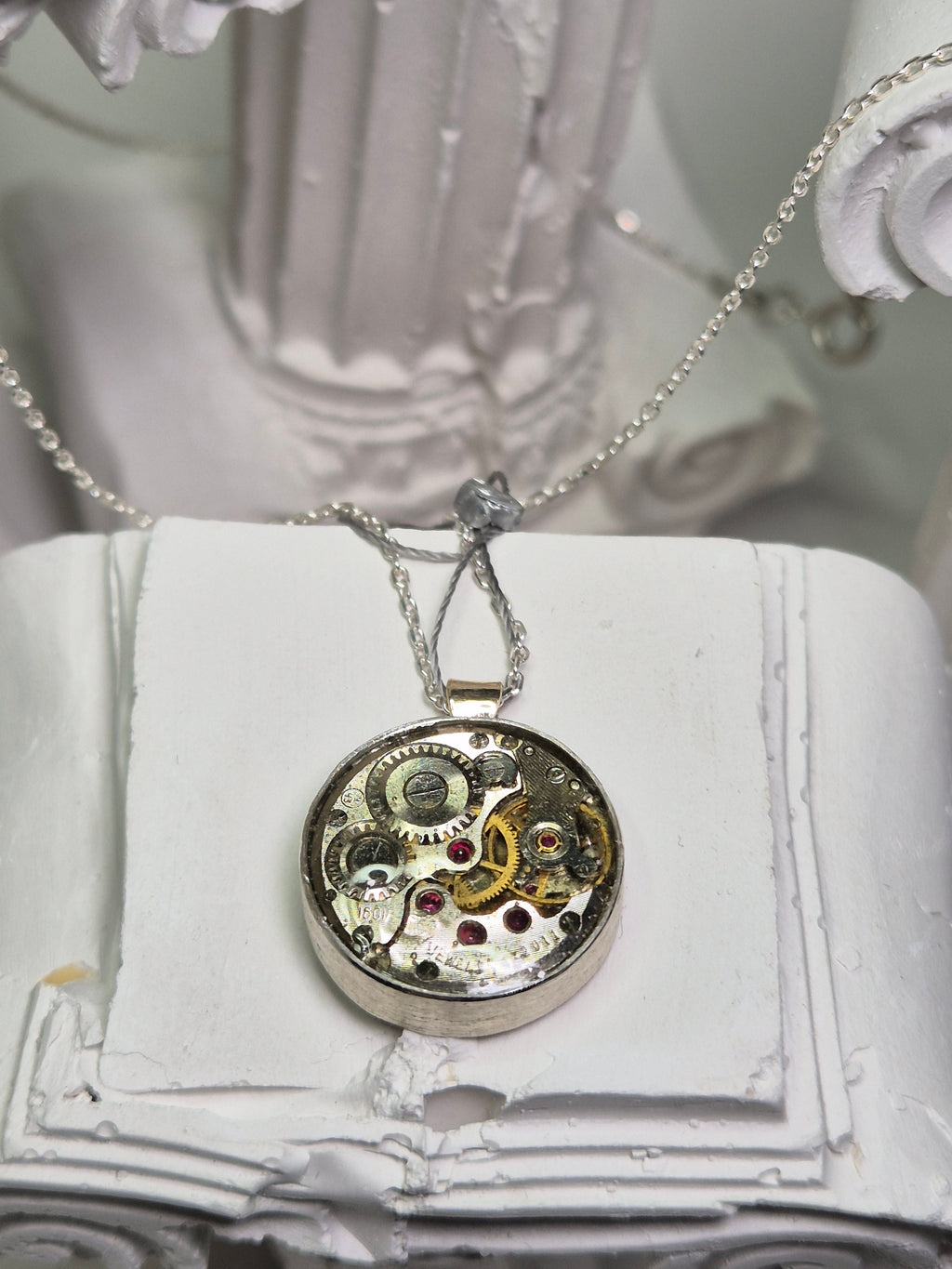 "Clockwork" pakabutis apvalus